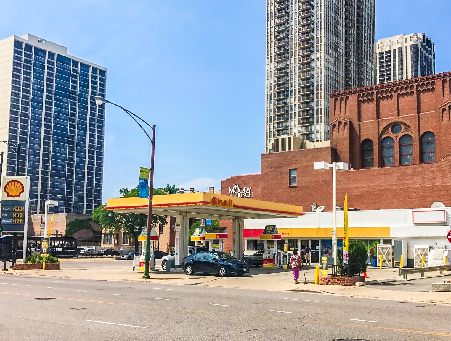 Developer Fern Hill wants to redevelop several properties on Chicago’s North Side, including this gas station at 130 W. North Ave. alongside The Moody Church. (CoStar)