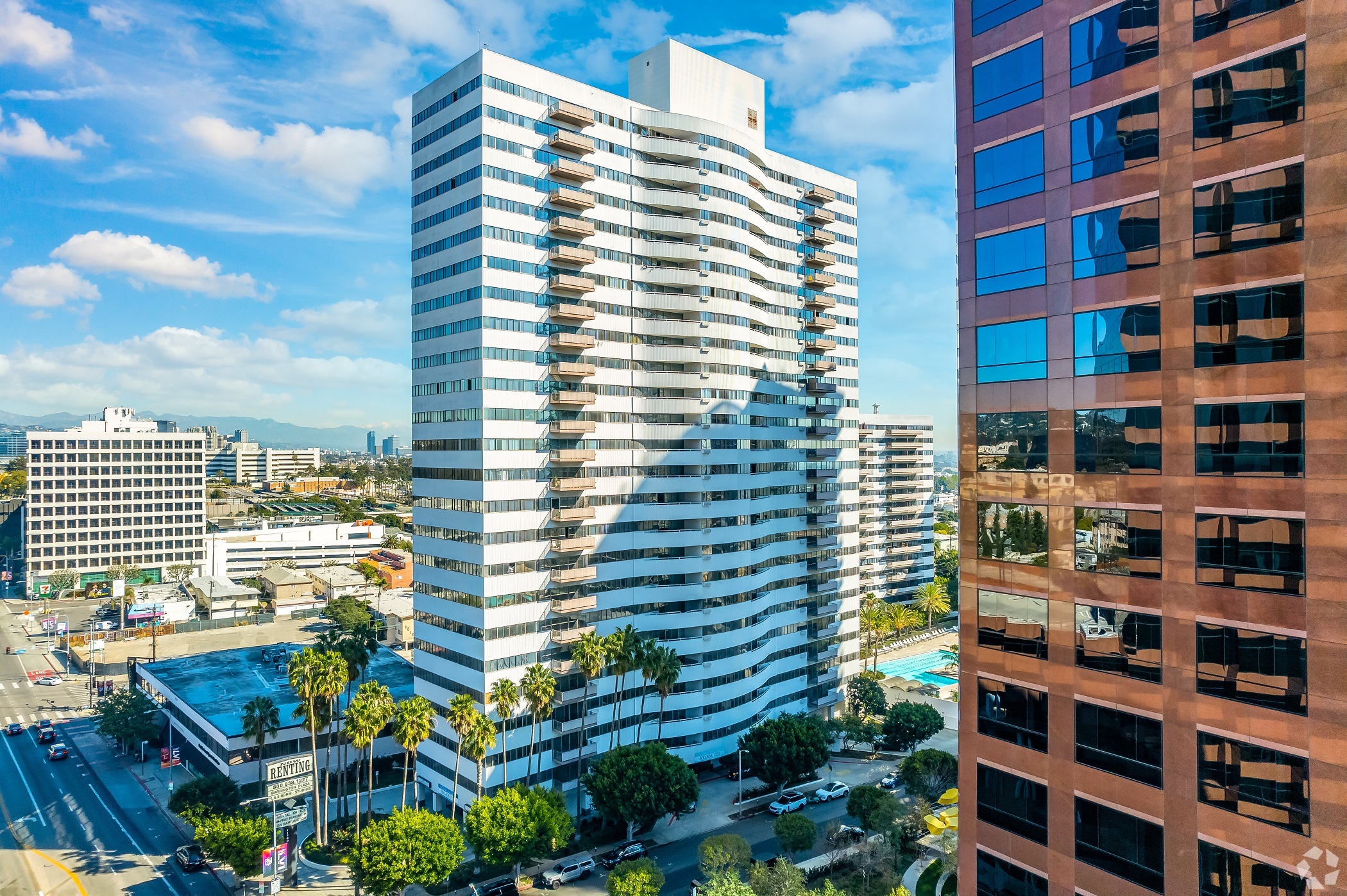Douglas Emmett expects to start some construction work on Barrington Plaza 11740 Wilshire Blvd. in Los Angeles after a fire broke out at the property in January 2020. (CoStar)