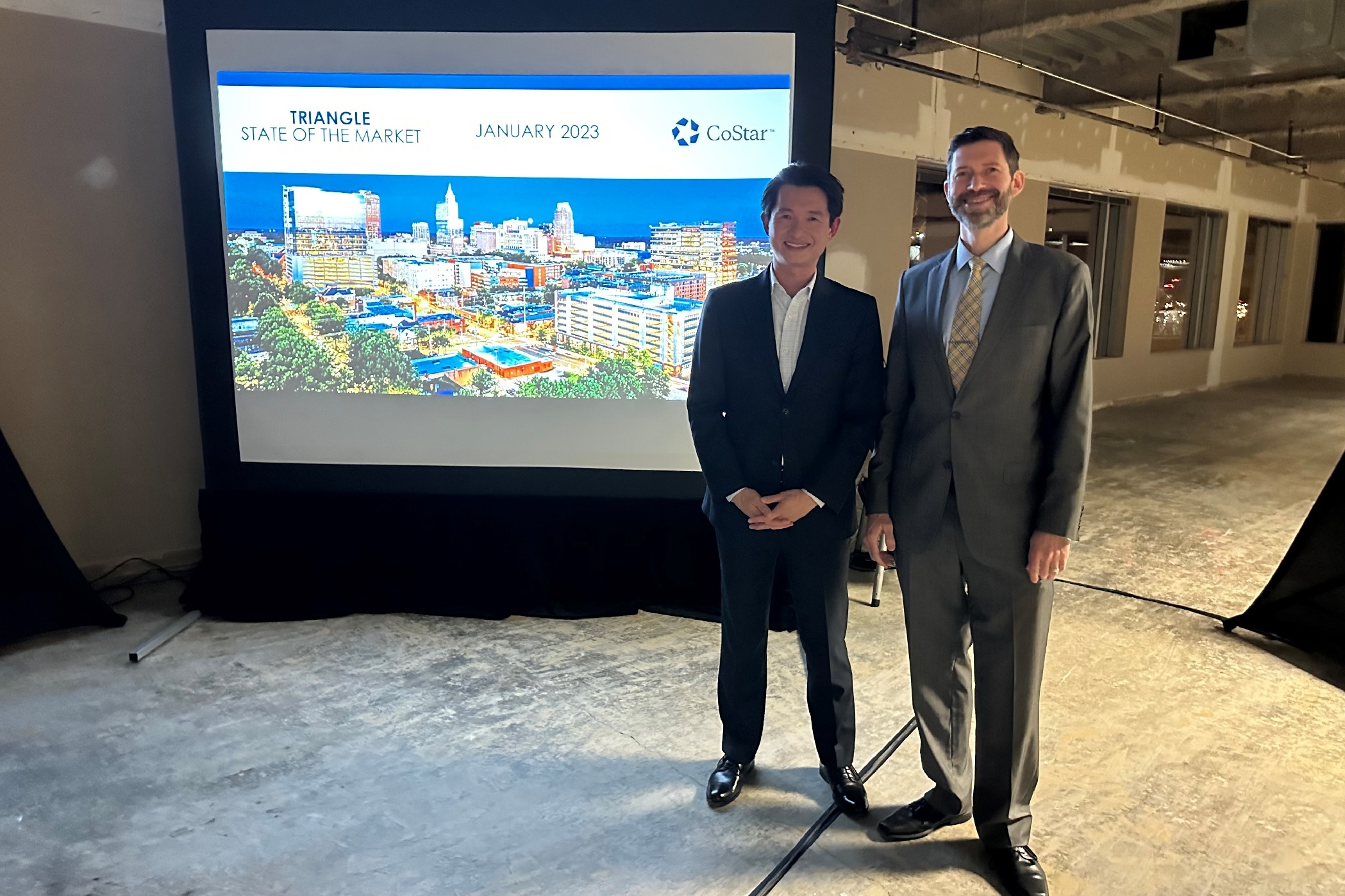 Christopher Chung, left, is the CEO of the Economic Development Partnership of North Carolina. (CoStar)