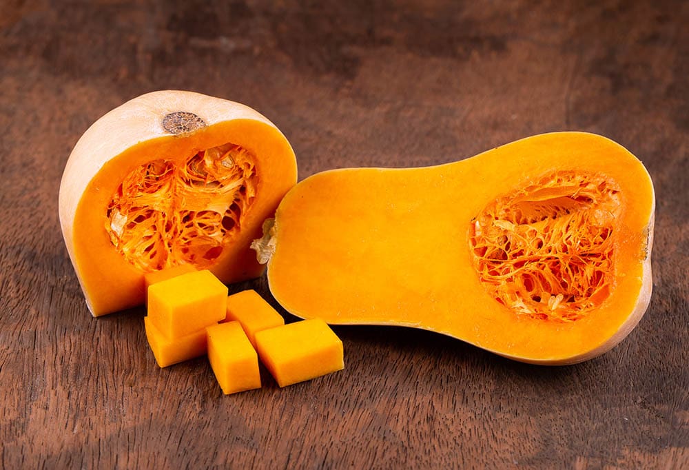 Butternut squash over old wood background