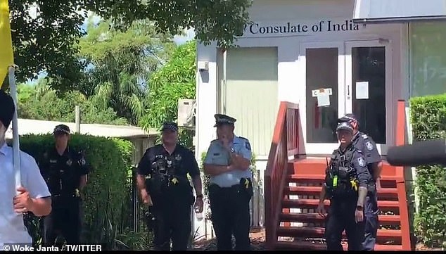Queensland police (pictured at the Consulate) said that the gathering was unauthorised
