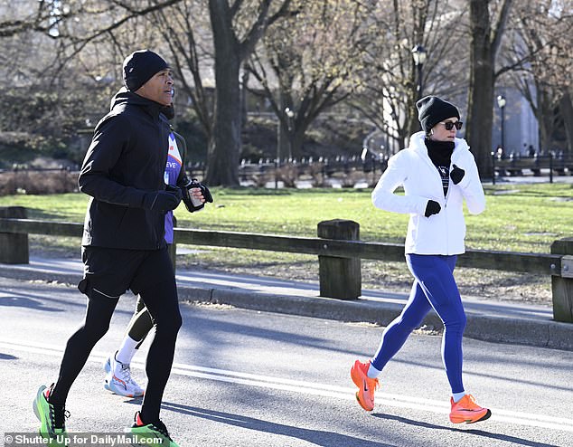 T.J. Holmes and Amy Robach were spotted bracing the cold to run the New York City Half Marathon Sunday morning - their first time doing so as a couple. The pair are seen Sunday near the 13.1 event