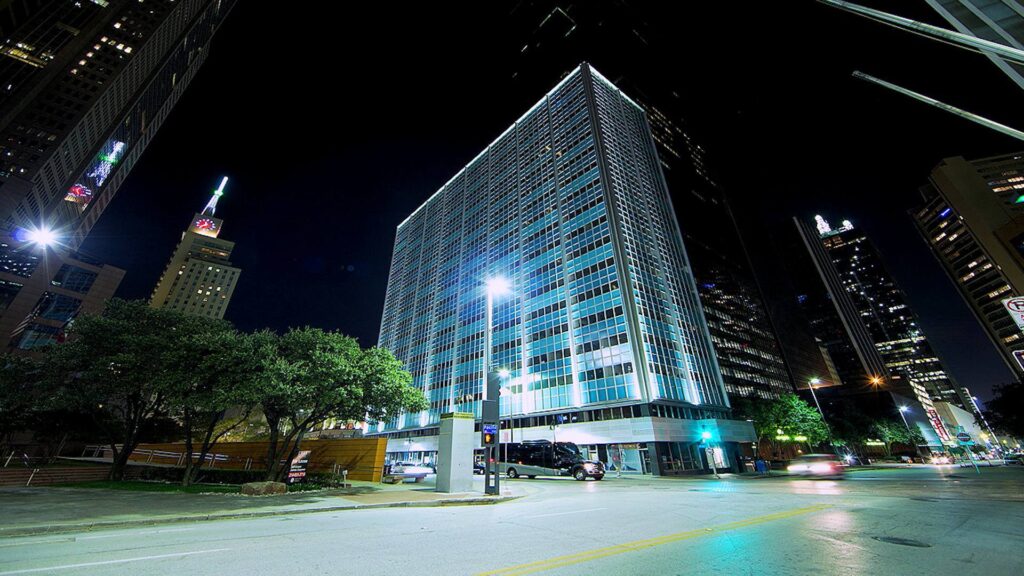The midcentury modern-style office building at 211 N. Ervay St. in downtown Dallas has been purchased by a new investment group. (CoStar)
