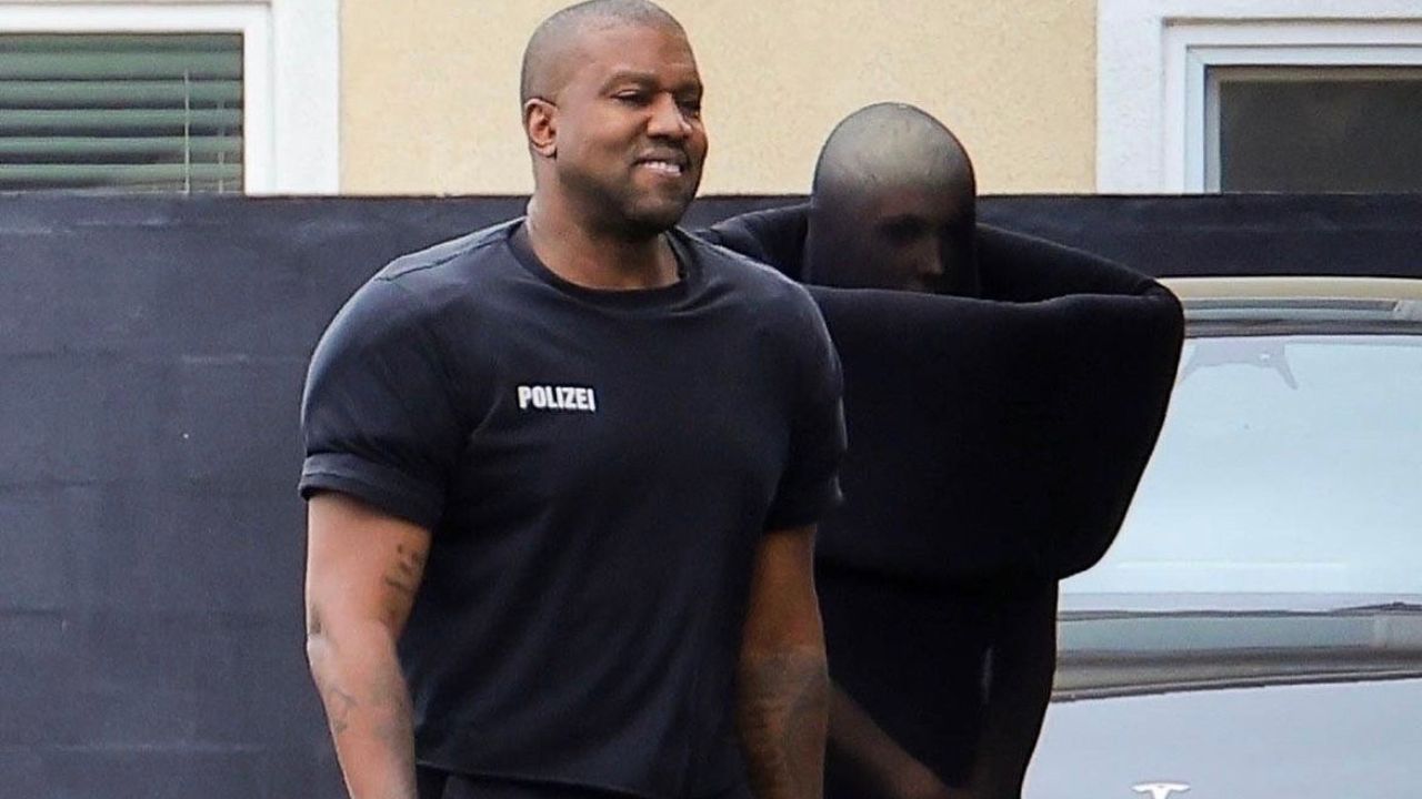 Kanye West Wore His Black Signature Vetements ‘Polizei’ Shirt and Leggings with wife Bianca Censori Who Channeled Maison Margiela