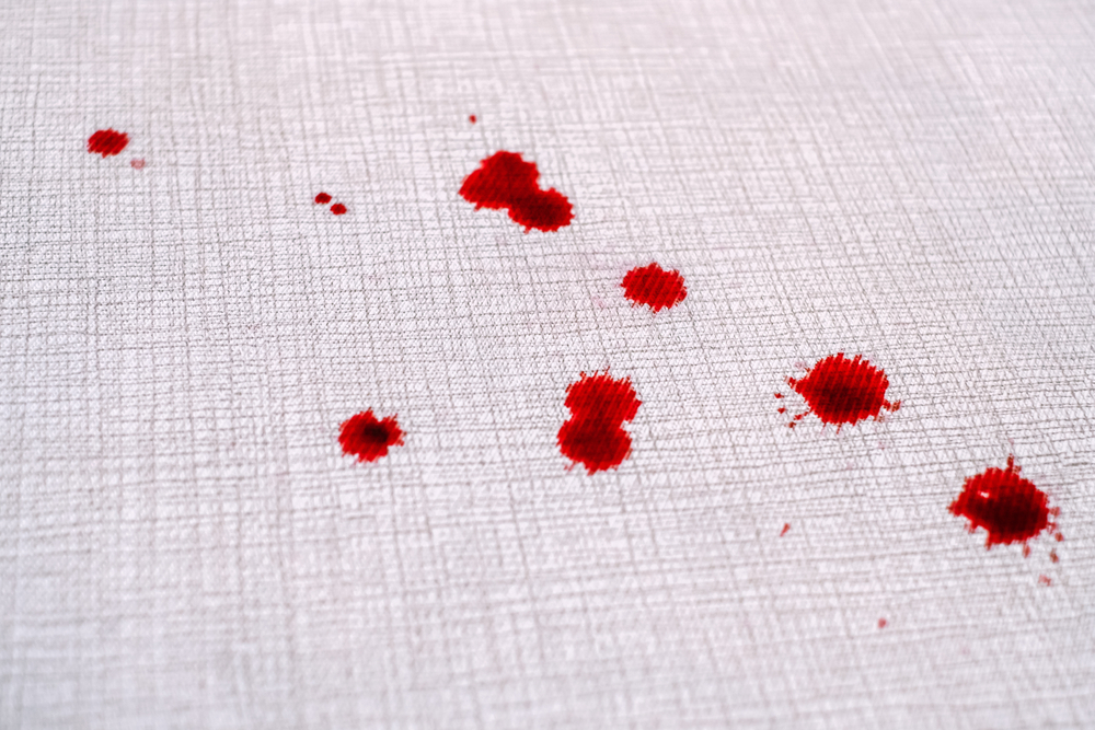 drops of blood on the carpet